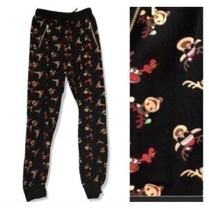 Christmas reindeer jogger pants size small with cuff ankle and gold zippers